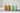 Tan cork yoga blocks and light green foam yoga blocks compared on a gray yoga mat, generated from product references