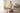 Senior woman sitting with great posture on lavender purple Trideer exercise ball for gentle elderly fitness