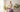 Senior woman sitting with great posture on lavender purple Trideer exercise ball for gentle elderly fitness