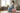 Pregnant woman using pregnancy ball for comfort and exercise during pregnancy