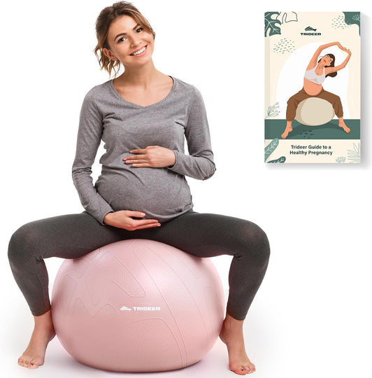 Pregnant woman using anti-burst pregnancy ball for prenatal exercise