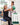 Woman practicing seated arm raises with a green Trideer mini ball under guidance, with an exercise guide shown.