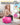 Girl sitting on a pink Trideer kids ball chair, with a diagram showing how its flexible feet compress.
