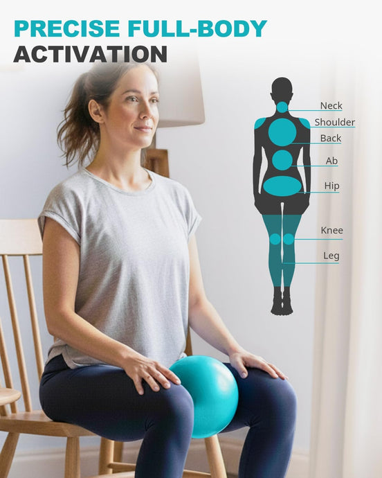 Woman seated on a chair with a turquoise Trideer mini Pilates ball between her knees