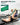 Woman lying on a treatment table using a green stretching strap for a raised-leg stretch with assistance.