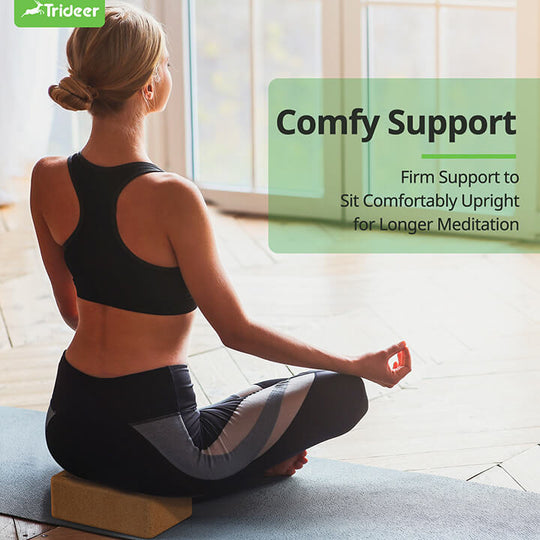Woman using sustainable cork yoga blocks for yoga pose alignment and support