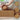 Natural cork yoga block close-up showing antimicrobial non-slip surface texture
